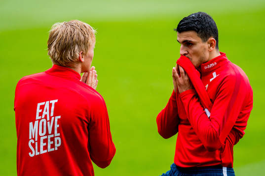 Birger Meling and Mohamed Elyounoussi of Norway