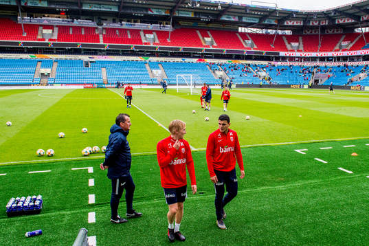 Birger Meling and Mohamed Elyounoussi of Norway