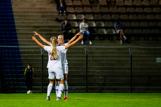 Emilie Nautnes and Karina Sævik of Norway celebrate the