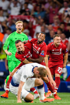 Dejan Lovren and Georginio Wijnaldum of Liverpool celebrate