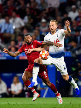 Georginio Wijnaldum of Liverpool and Harry Kane of Tottenham
