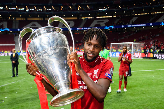 Divock Origi of Liverpool celebrate with the trophy