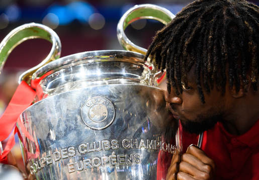 Divock Origi of Liverpool celebrate with the trophy