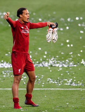 Virgil van Dijk of Liverpool celebrate