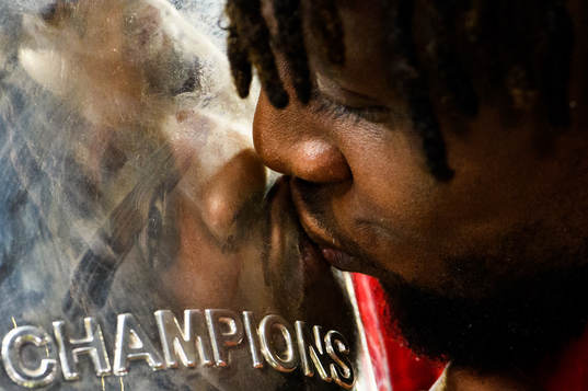 Divock Origi of Liverpool celebrate with the trophy
