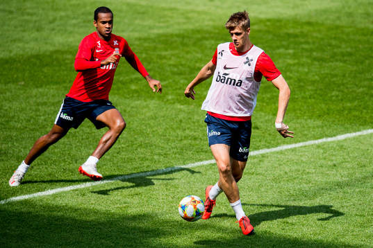 Ola Kamara and Kristoffer Ajer of Norway