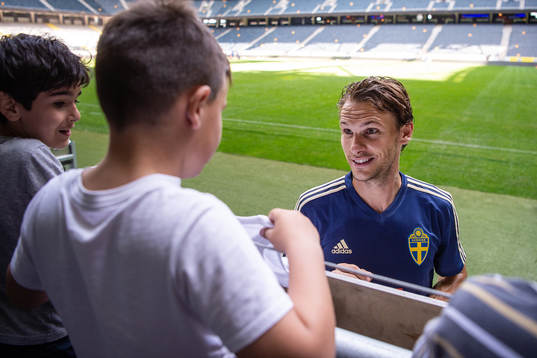 Albin Ekdal of the Swedish national football team signs