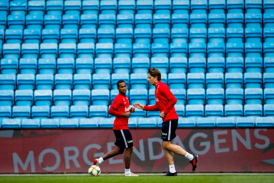 Ola Kamara and Sander Berge of Norway