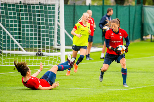Ingrid Moe Wold and goalkeeper Cecilie Hauståker