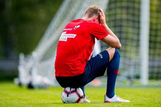 Halldor Stenevik of Norway looks dejected