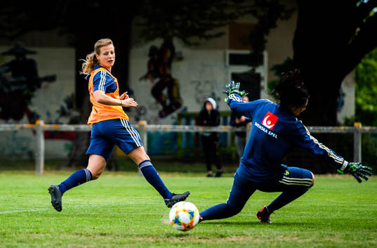 Anna Anvegård and goalkeeper Zecira Musovic of Swedish