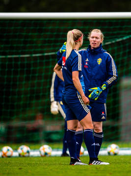 Amanda Ilestedt and goalkeeper Hedvig Lindahl of Swedish