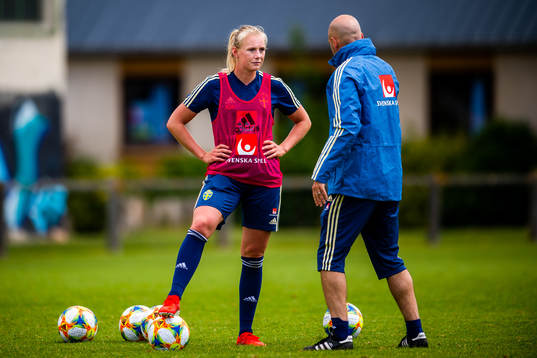 Stina Blackstenius and Magnus Wikman, assistant coach of