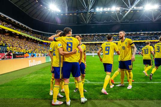 Robin Quaison of Sweden celebrate with teammates