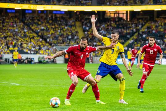 Andrei Agius of Malta and Marcus Berg of Sweden