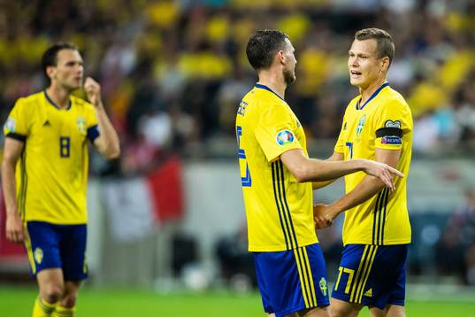 Marcus Berg and Viktor Claesson of Sweden celebrates