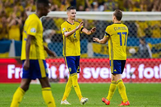 Mikael Lustig and Viktor Claesson of Sweden celebrate