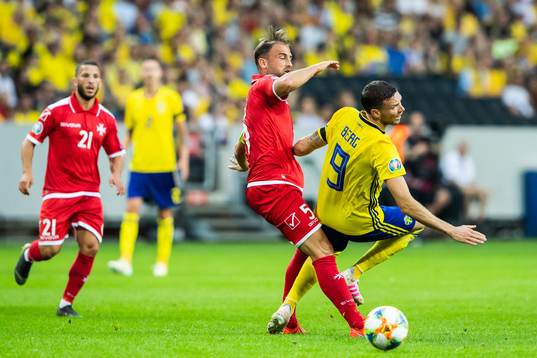 Ferdinando Apap of Malta and Marcus Berg of Sweden