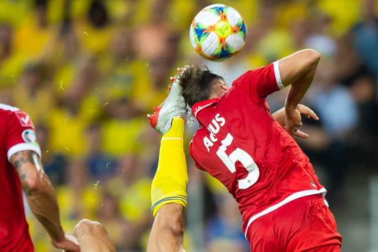 Robin Quaison of Sweden with a bicycle kick against
