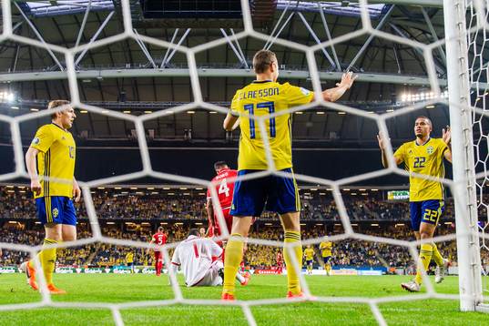 Viktor Claesson celebrate with Emil Forsberg and Robin