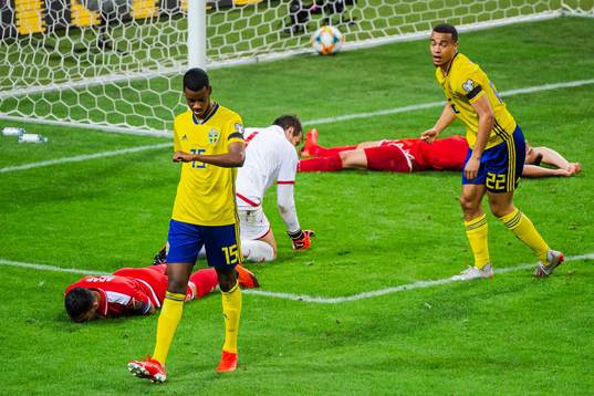 Alexander Isak and Robin Quaison of Sweden celebrate