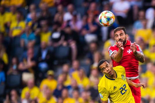 Robin Quaison of Sweden and Andrei Agius of Malta