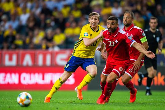 Emil Forsberg of Sweden and Alfred Effiong of Malta