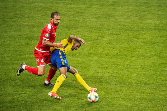 Steve Borg of Malta and Robin Quaison of Sweden