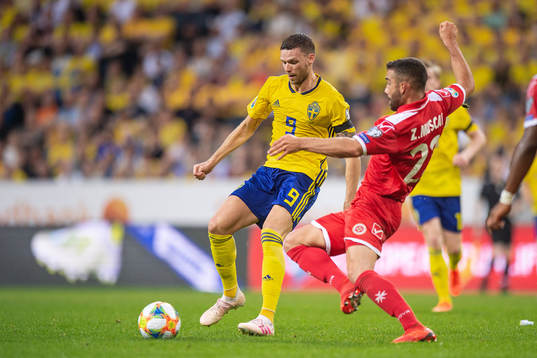 Marcus Berg of Sweden and Zach Muscat of Malta