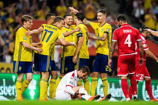 Viktor Claesson of Sweden celebrate with Emil Forsberg,