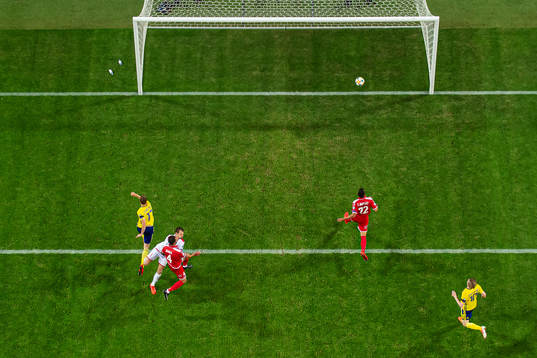 Viktor Claesson of Sweden scores 2-0 behind goalkeeper
