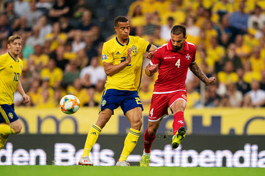 Robin Quaison of Sweden and Steve Borg of Malta