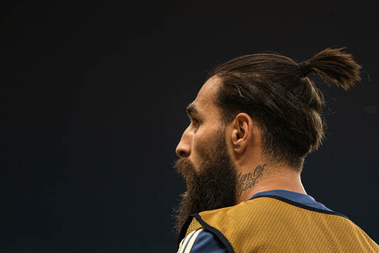 Jimmy Durmaz of Sweden with a tattoo saying Son of God