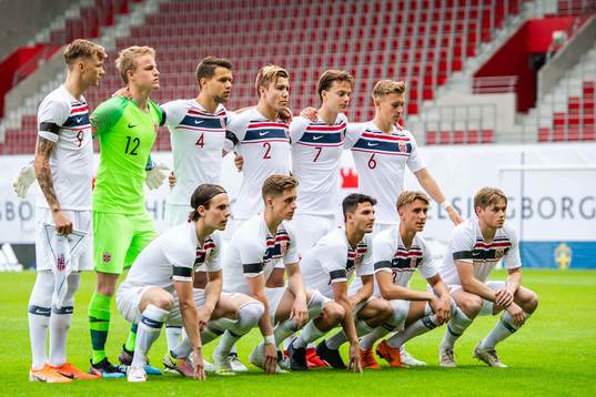 Players of Norway pose for a team group photo