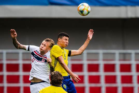 Alexander Jallow of Sweden in a duel with Brik Risa of