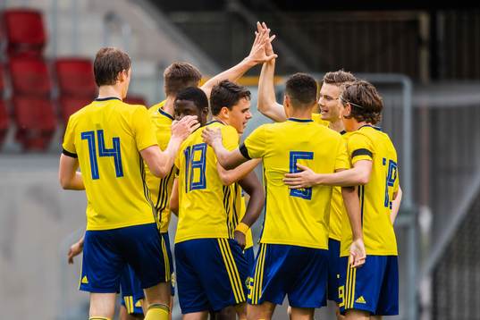 Benjamin Mbunga Kimpioka of Sweden celebrate with teammates