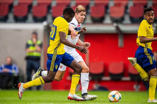 Benjamin Mbunga Kimpioka of Sweden and Fredrik André
