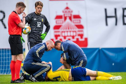 Hugo Andersson of Sweden in pain