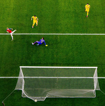 Martin Ødegaard of Norway scores 2-0 behind Cristian