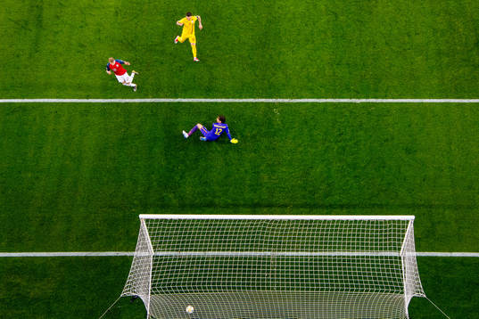 Martin Ødegaard of Norway scores 2-0 behind Cristian