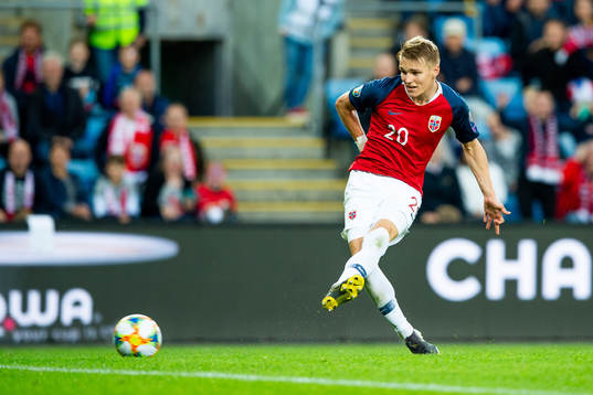 Martin Ødegaard of Norway scores the 2-0 goal