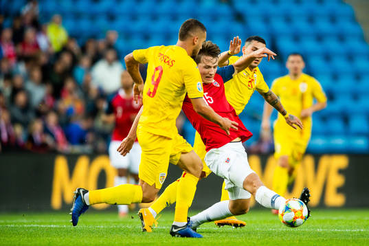 George Puscas of Romania and Sander Berge of Norway