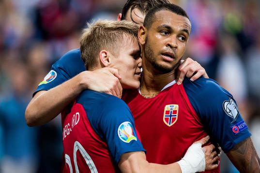 Martin Ødegaard of Norway celebrates with teammate Joshua