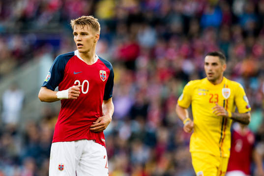 Martin Ødegaard of Norway and Nicolae Stanciu of Romania