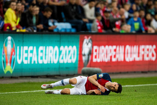 Tarik Elyounoussi of Norway looks dejected