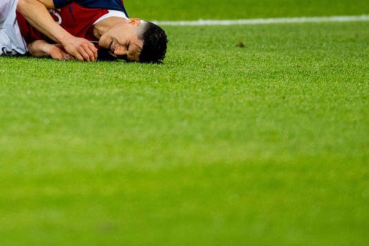 Tarik Elyounoussi of Norway lies down