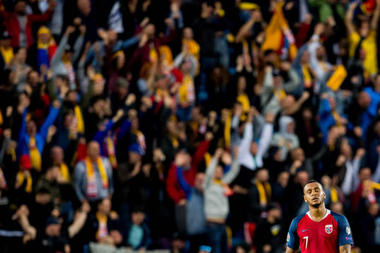 Joshua King of Norway looks dejected