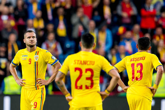 George Puscas of Romania looks dejected