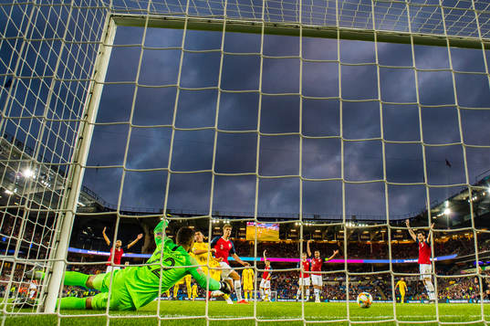 Claudiu Keșerü of Romania scores the 2-2 goal