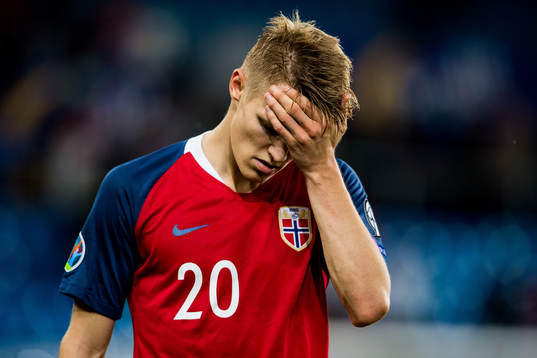 Martin Ødegaard of Norway looks dejected